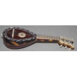 Vintage miniature tortoiseshell mandolin