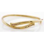 Champagne diamond and 9ct yellow gold bangle