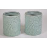 Pair of Chinese celadon dragon pots