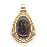 A large boulder opal and 9ct gold pendant