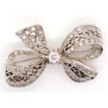 Diamond and 14ct white gold bow brooch