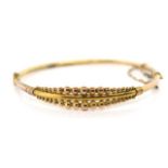 Early 20th C. 9ct yellow gold bangle