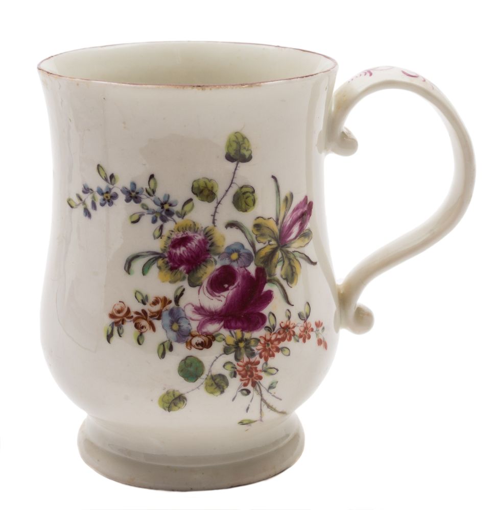 A Derby bell-shaped mug: with scroll handle painted in 'cotton stem' style with floral sprays and