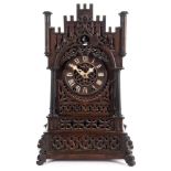 An oak Black Forest cuckoo clock: the eight-day duration, double-fusee movement with wooden plates,