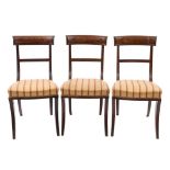 A set of six Regency mahogany dining chairs,