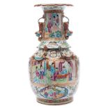 A Cantonese porcelain vase: of baluster form with frill neck supported by four chilongs,