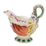 A First Period Worcester creamboat: of shell-shaped 'Dolphin Ewer' form with lamprey handle,