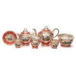 A Ridgway orange ground topographical porcelain part tea service: painted with castles,