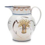 An early 19th century pearlware jug: decorated in Pratt colours with farming implements and a