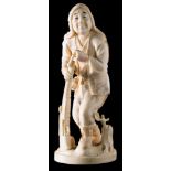 A Japanese carved ivory okimono of a hunter: leaning on his matchlock gun smoking a pipe,