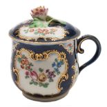 A First Period Worcester custard cup and cover: of bell shape with flower finial,