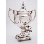 A silver plated two-handled samovar: of traditional design with domed lift-off lid,