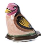 A Bilston enamel bird bonbonniere: in the form of a goldfinch,