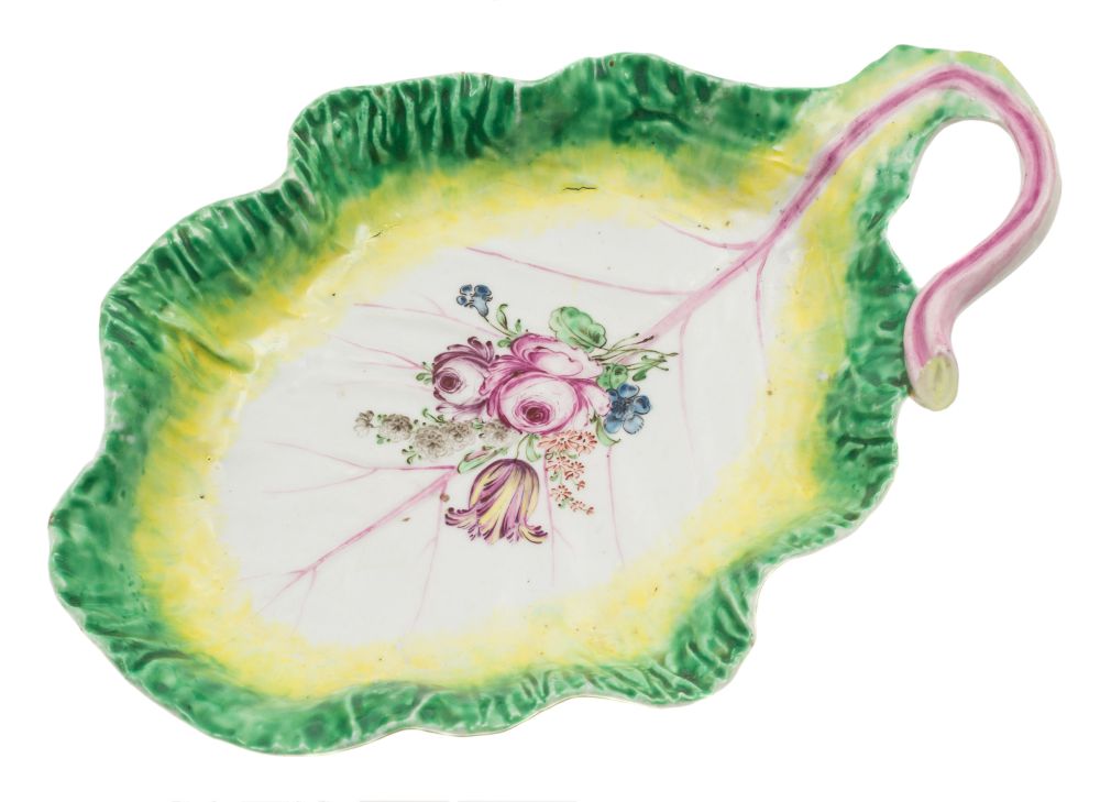 A Longton Hall cabbage leaf dish: with curled stalk handle,