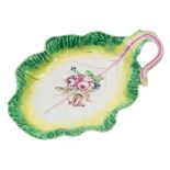 A Longton Hall cabbage leaf dish: with curled stalk handle,
