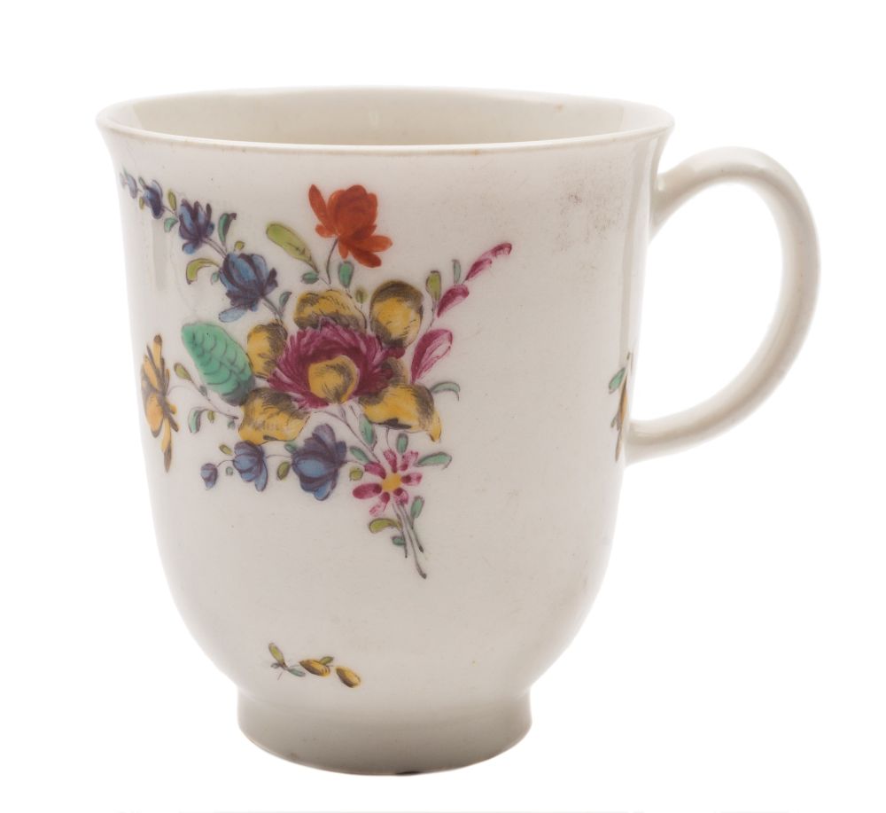 A Bow chocolate cup: with loop handle, painted with a floral spray and scattered sprigs,