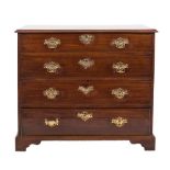 A George III mahogany rectangular chest:, the top with a moulded edge, containing four long drawers,