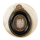 A small early 19th century Continental religious quillwork picture: the central oval plaque with