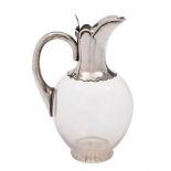 A George V silver mounted and clear glass claret jug, maker Goldsmiths & Silversmiths Company Ltd,