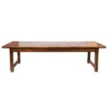 A contemporary elm farmhouse kitchen table:, the rectangular top on square chamfered legs,