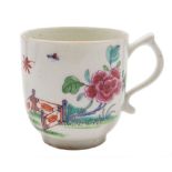 A Bow coffee cup: with scroll handle, painted in the famille rose palette with a large pink peony,