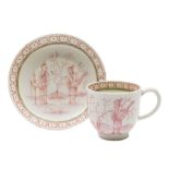 A Lowestoft coffee cup and saucer: painted in pink monochrome with two Chinese figures in a garden,