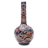 A Japanese Imari porcelain bottle vase: of globular form with slender raised neck embossed with an