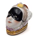 A Chelsea bonbonniere: in the form of a lady's head, wearing a black mask,