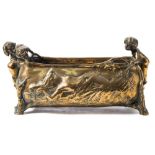 After Charles Korschann (1872-1943) a brass planter: of rectangular outline,