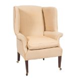 A mahogany wing frame armchair in the Georgian taste:,