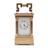 A miniature Anglaise carriage clock with fluted columns: the eight-day duration movement having a