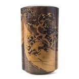 A Japanese four section lacquered inro: decorated with flowing silk blowing amongst trees, unsigned,