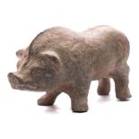 A Chinese grey pottery figure of a boar: standing with head slightly lowered, with spinal crest,