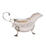 A Edward VII silver sauce boat, maker Walker and Hall, Sheffield, 1905: of traditional design,