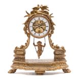 A French mantel clock with an unusual pendulum: the eight-day duration timepiece movement visible