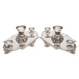 A pair of silver plated table centrepieces: of lozenge -shaped outline,