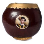 An unusual late Victorian/Edwardian 15ct gold mounted nut vesta case: set with a circular enamel