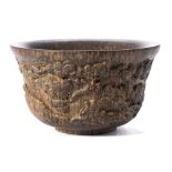 A Chinese carved hardwood bowl: decorated with cranes amongst pine trees,