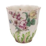 A Chelsea spirally-moulded beaker: the lower part with bright green and pink leaves,