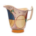 A Clarice Cliff Fantasque milk jug: of helmet shaped form decorated in the Melon (Picasso Fruit)