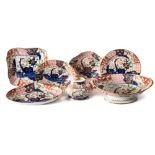 A Coalport porcelain 'Japan' pattern part dessert service: painted and gilded with rockwork, trees,