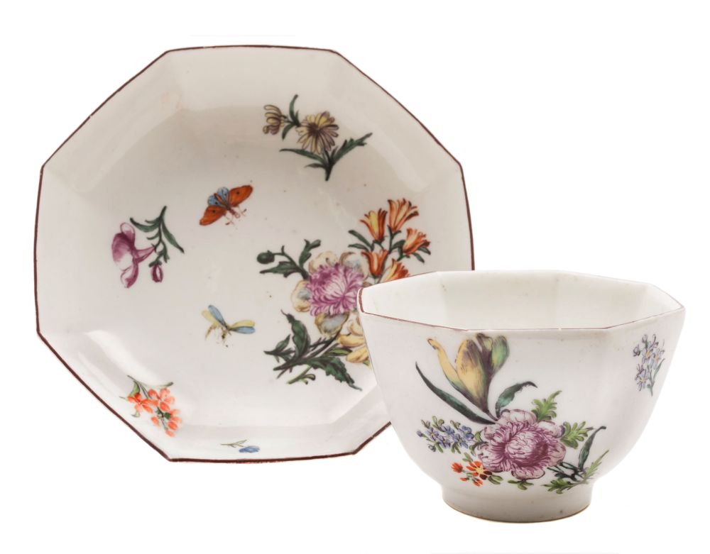 A Chelsea octagonal teabowl and saucer: finely painted with insects, floral sprays and sprigs,