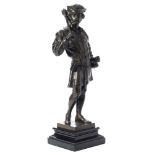 A bronze study of a medieval guard: dark brown patination,