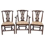 A set of seven late 19th Century carved beech dining chairs in the Chippendale taste:,