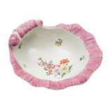 A First Period Worcester shell sweetmeat dish: with shaped and curled pink rim and painted with a