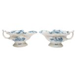 A pair of First Period Worcester blue and white high-footed sauceboats: each of silver shape with