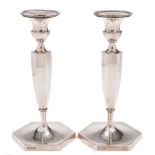 A pair of Edward VII silver candlesticks, maker Hawksworth Eyre & Co Ltd,