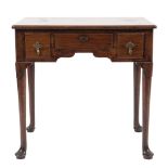 WITHDRAWN A George II mahogany rectangular lowboy:, the top with a moulded edge,