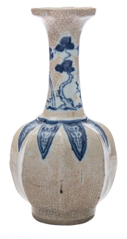 A Chinese blue and white crackle-glazed vase: with waisted neck and octagonal section body,