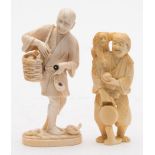 A Japanese carved ivory okimono of a fisherman: carrying his catch in a basket,